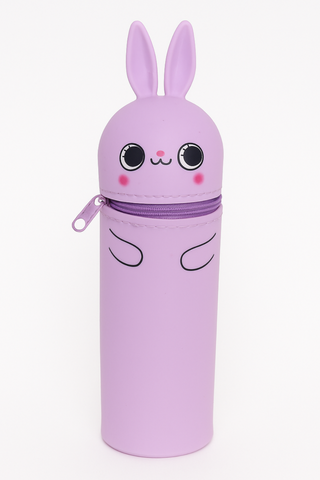 Purple cylindrical silicone pencil case with a kawaii cartoon bunny face on a white background